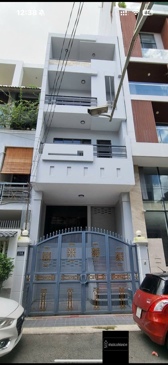 Bán nhà hầm 5 lầu sân thượng đườn Sông Đà Tân Bình 