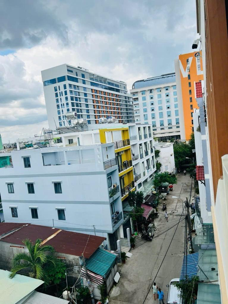 Thu nhập 2ty/nam tòa nhà 26 CHDV full NT ngang 10m hầm 5 tầng ngay ĐH Văn Lang